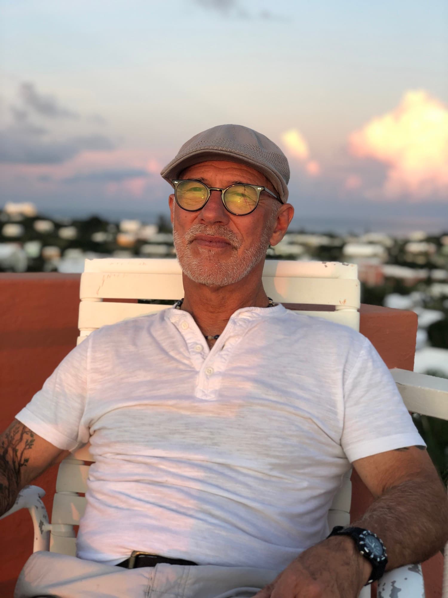 Pops at sunset on a rooftop overlooking Bermuda